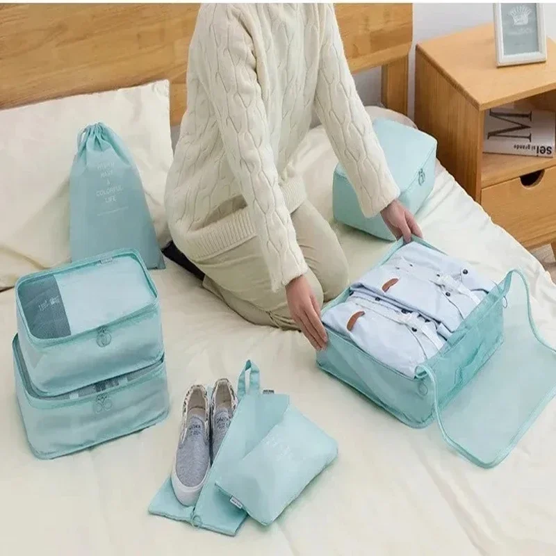 ensemble d'organisateurs de voyage, sacs de rangement, valise, cubes d'emballage, étuis portables, bagages, vêtements, chaussures, pochette de rangement pliante