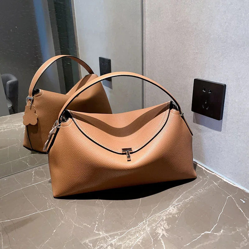 2025 nouveau sac à main en cuir sac de travail à bandoulière à la mode polyvalent élégant design suédois peau de vache souple taille moyenne usage quotidien