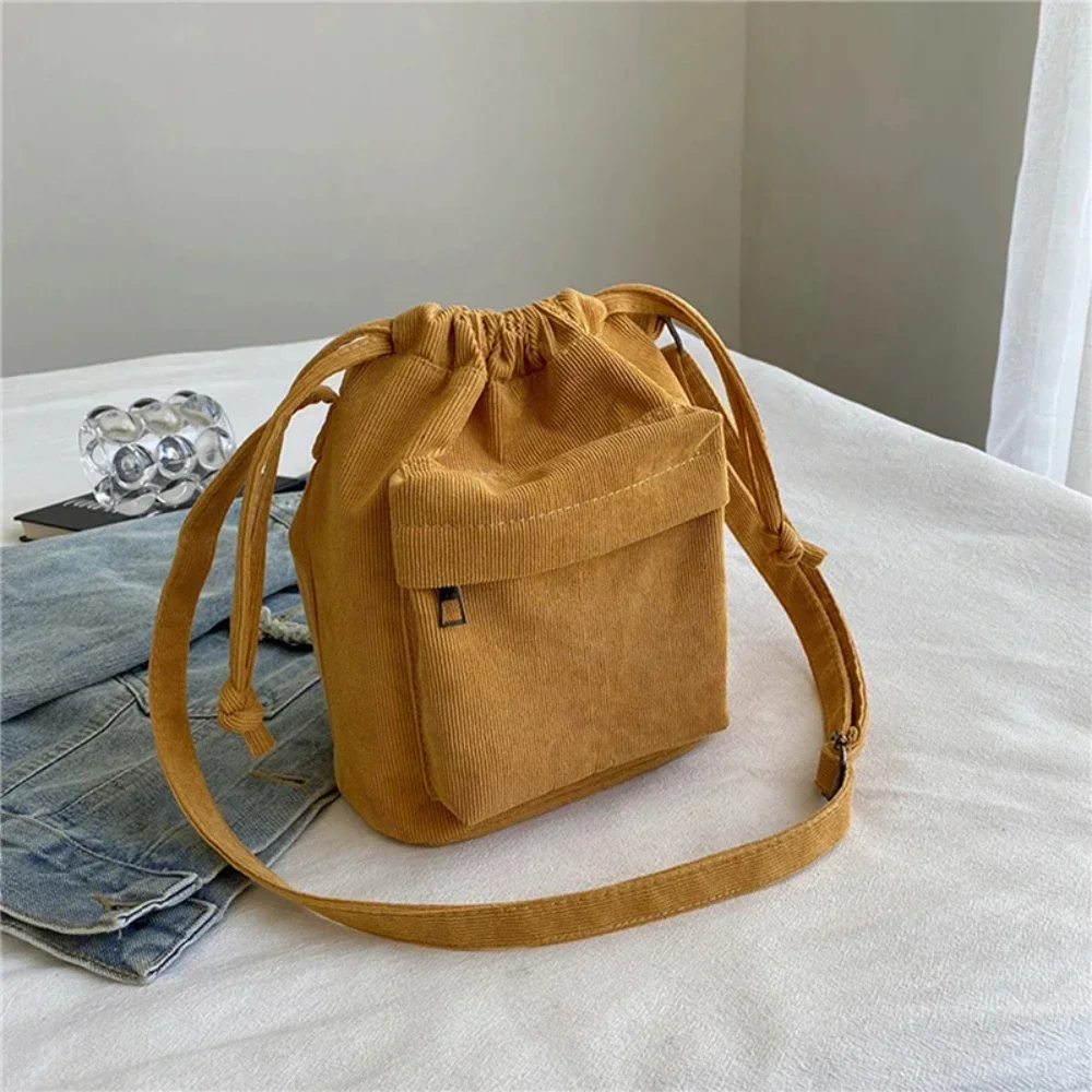 2025 nouvelles femmes sac moyen sac à bandoulière style coréen cordon seau sac décontracté léger jeunesse sac à bandoulière vente entière