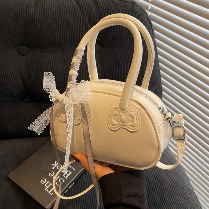 Sac pour femmes Version coréenne élégant Portable sac d'oreiller femmes sens supérieur Simple dentelle douce épaule bandoulière mignon sac à nœud