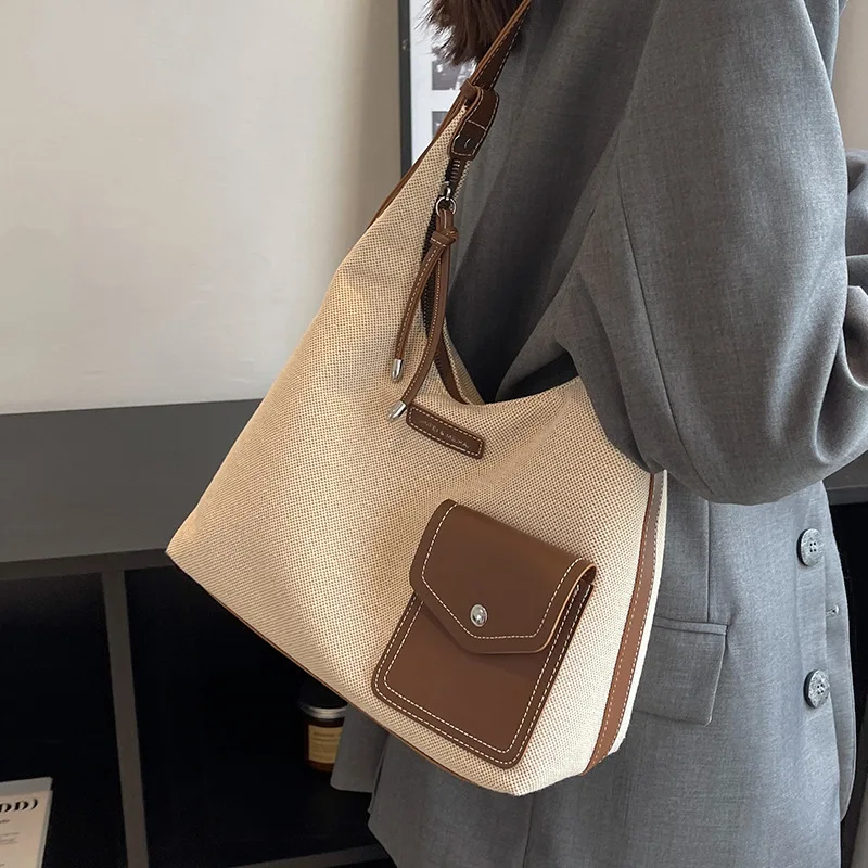 sacs à main créatifs au design populaire pour femmes, sac à bandoulière décontracté sous les bras, seau en toile de luxe de styliste, nouvelle collection