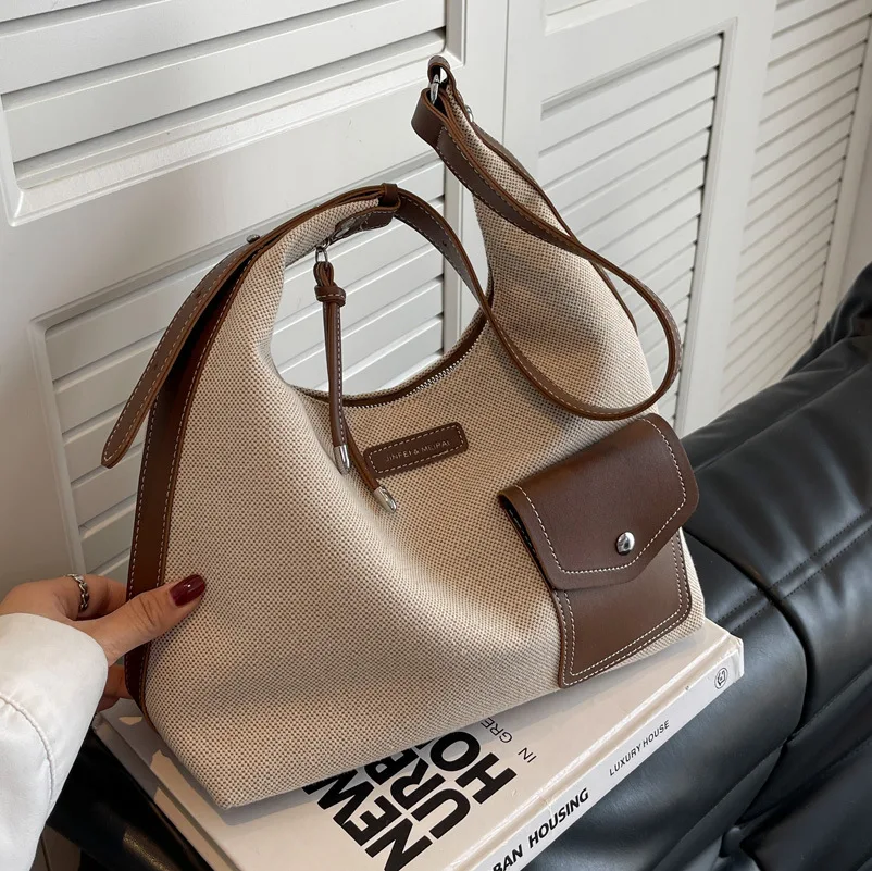sacs à main créatifs au design populaire pour femmes, sac à bandoulière décontracté sous les bras, seau en toile de luxe de styliste, nouvelle collection
