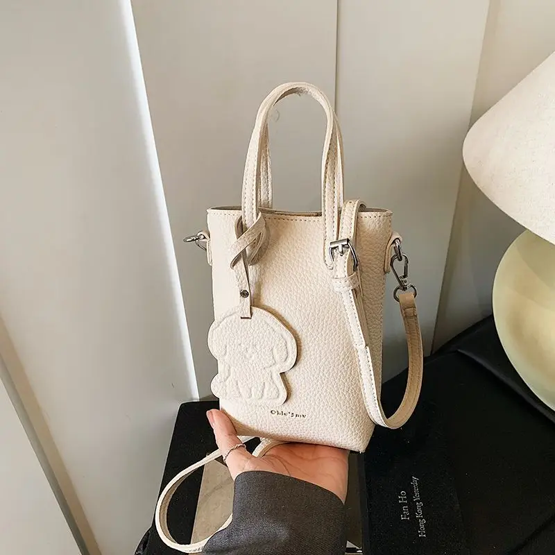 sac à main décontracté à la mode, design simple, sac à bandoulière pour femmes, nouveau style de printemps, version coréenne, sensation haut de gamme, cuir pu