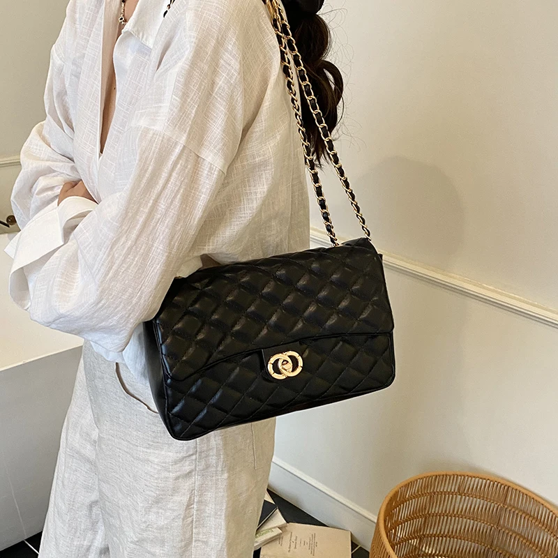 sac à bandoulière élégant de style design pour femme : sac à main luxueux en cuir avec bandoulière, sac à main chic pour femme
