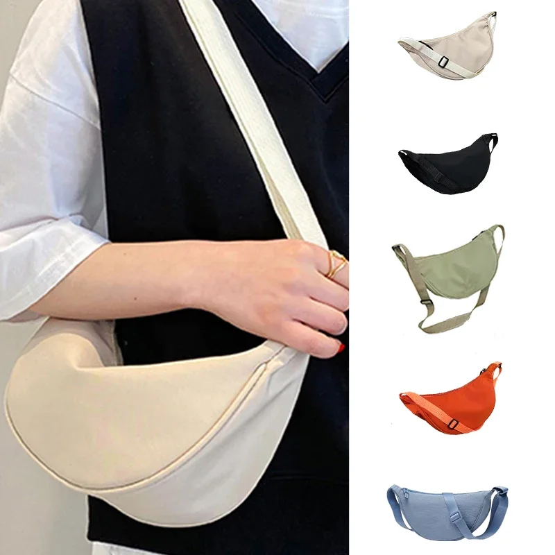 Sac pour femme – Un sac en nylon de forme ronde avec une bandoulière, adapté aux voyages, à l'école ou au shopping.