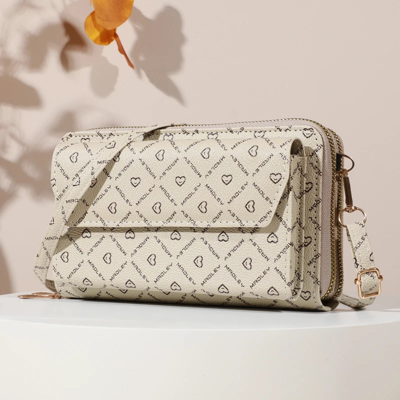 sac à bandoulière chic pour femme – porte monnaie pour téléphone compact avec fentes pour cartes sécurisées – sac à main élégant pour une commodité en déplacement