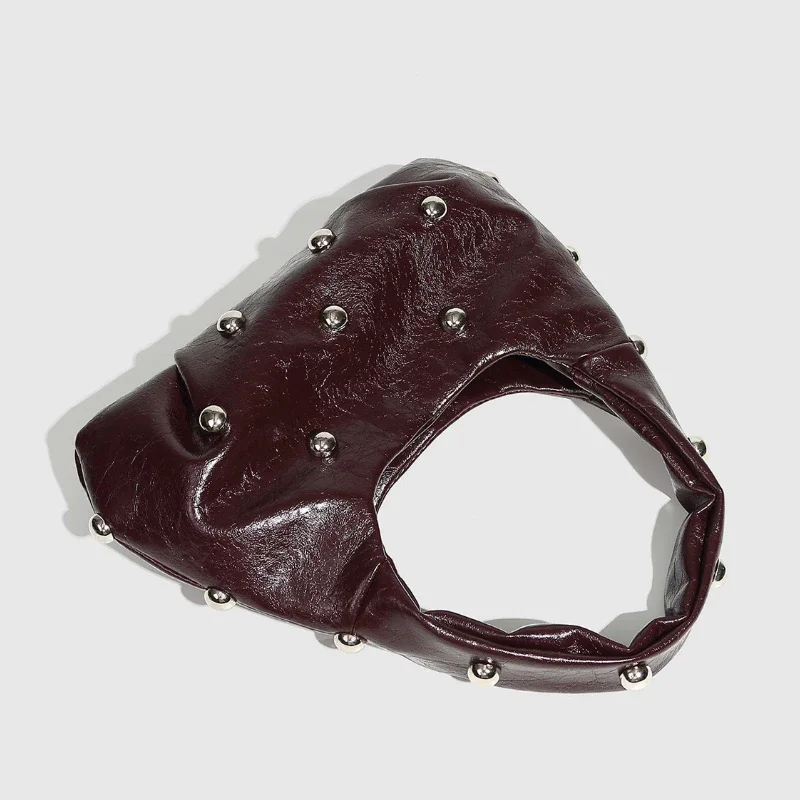 Niche luxe Chic dame Rivet sac à bandoulière 2025 nouveau concepteur Hobos demi-lune sous les bras sacs mode rétro haut de gamme femmes sacs à main