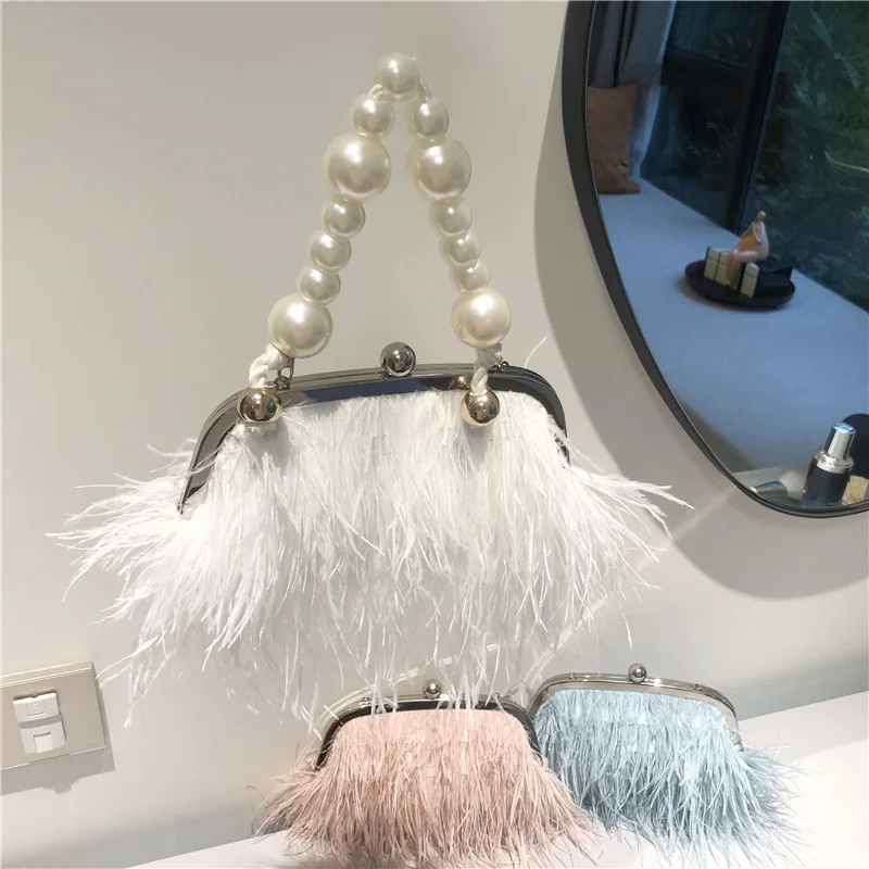 sac à poignée de marque de luxe 2025 mode femme portefeuille rétro lux sac à bandoulière nouveau tempérament plumes perle chaîne bandoulière pochette