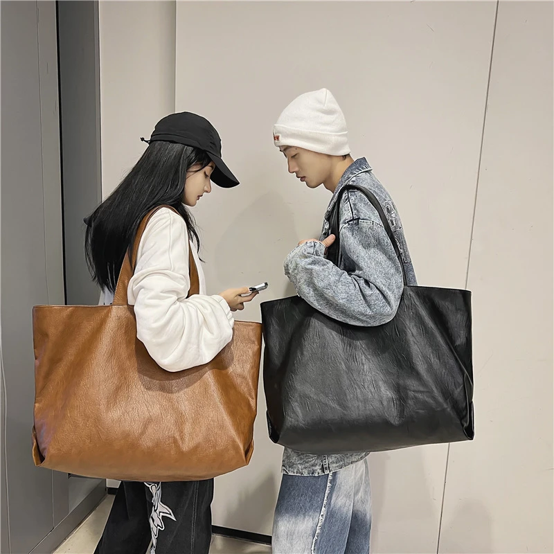 sacs fourre tout surdimensionnés de couleur noire pour femmes, sac à bandoulière léger de grande capacité en cuir souple unisexe simple mode shopper 2021