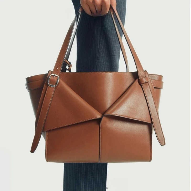 sac fourre tout de grande capacité de petit design 2025, sac seau d'eau simple européen et américain, sac à bandoulière à une épaule pour femmes