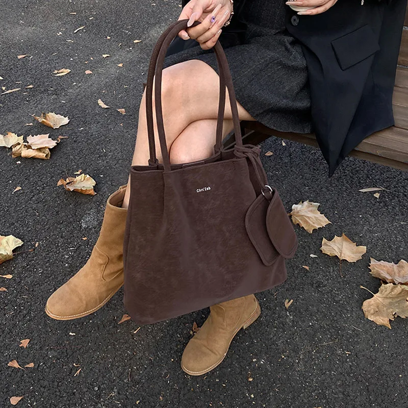 sac seau rétro mode europe amérique sac fourre tout tendance simple polyvalent design unique sac à bandoulière nouveau sac pour femmes de grande capacité
