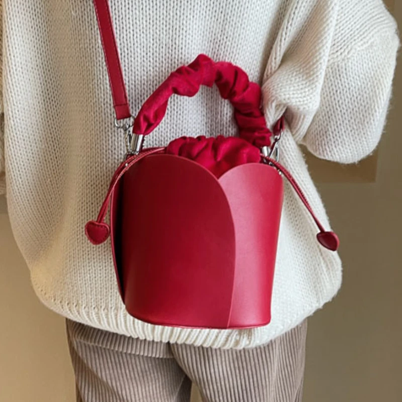 sac seau de luxe pour femmes, sac seau de style pétale de haute qualité, mode polyvalent, couleur unie, sac de transport pour les déplacements, offre spéciale, 2025