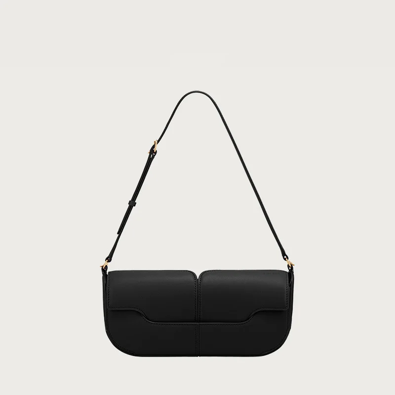 Niche automne et hiver sac sous les bras à une épaule, sac à main en peau de vache, sac baguette à main décontracté et simple