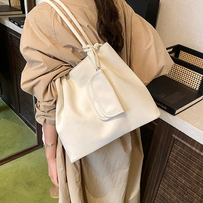 sac seau rétro mode europe amérique sac fourre tout tendance simple polyvalent design unique sac à bandoulière nouveau sac pour femmes de grande capacité