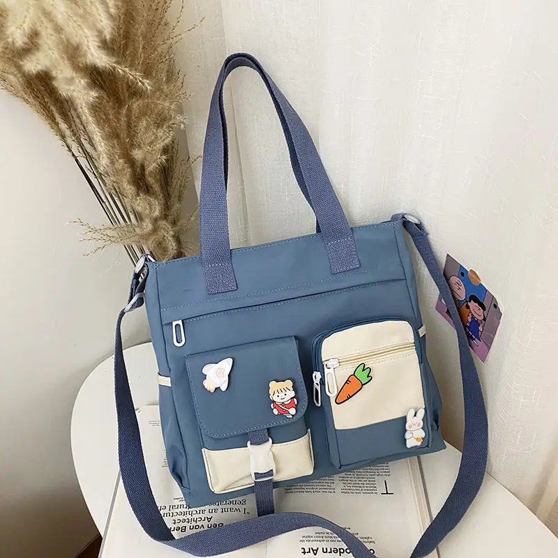 nouveau sac à main d'école de créateur sac de messager pour les jeunes adolescentes sac à bandoulière fourre tout grande capacité en nylon femmes sac à bandoulière cartables