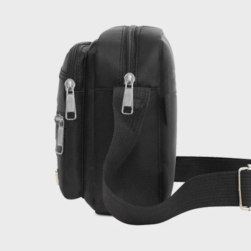 sac d'affaires pour hommes avec deux poches, peut être porté à bandoulière ou au dessus de l'épaule, adapté aux voyages d'affaires.
