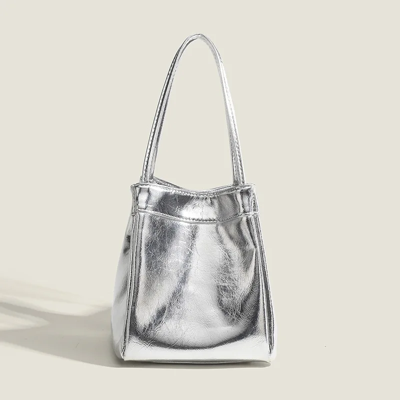 sac seau argenté pour femmes, nouveau sac de boîte à déjeuner simple et à la mode, petit sac à main à texture de niche de style occidental, 2024