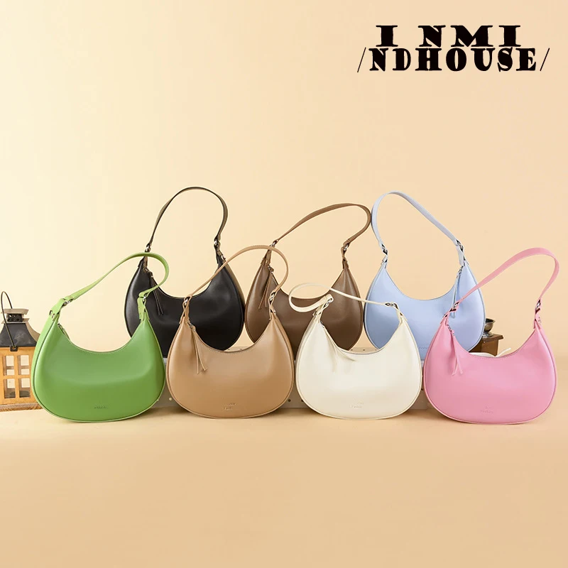 sac baguette cartable de style européen et américain, sac sous les ati elles, sac de moto à bandoulière populaire, design littéraire, tendance, nouveau, été 2024