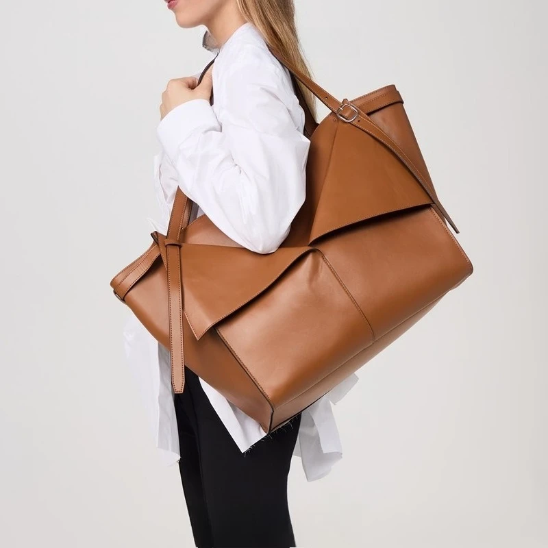 sac fourre-tout de grande capacité de petit design 2025, sac seau d'eau simple européen et américain, sac à bandoulière à une épaule pour femmes