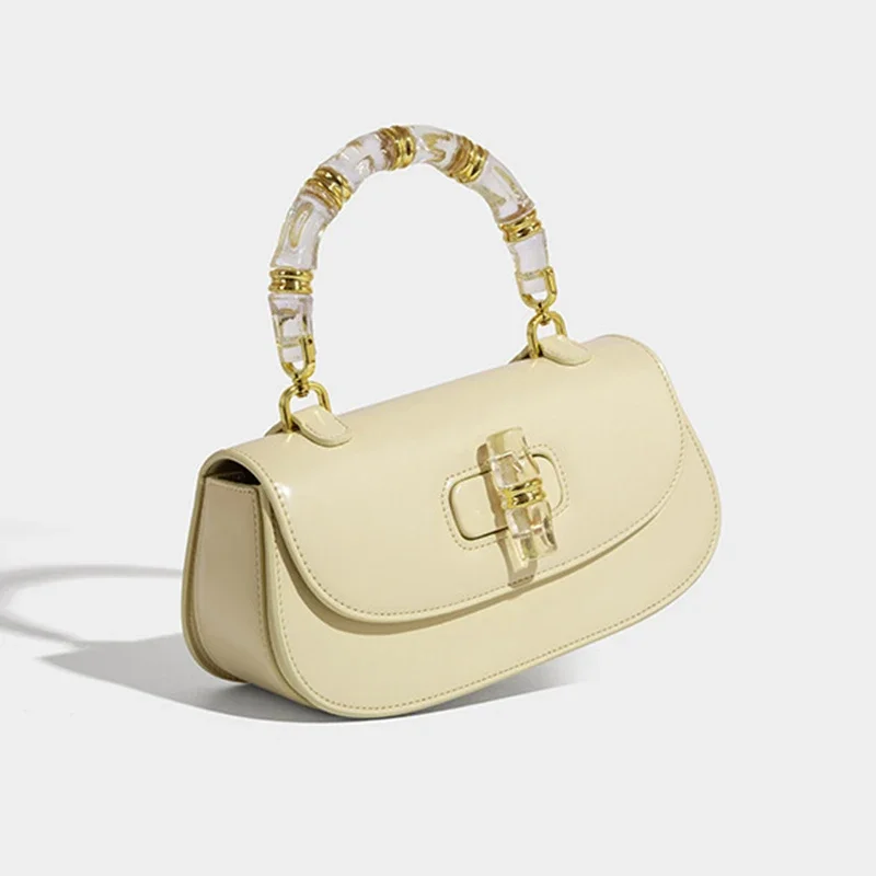super beau sac à main en bambou rétro marque sac de selle nouveau sac pour femmes haut de gamme exquis luxe rose serrure en cuir sac à bandoulière