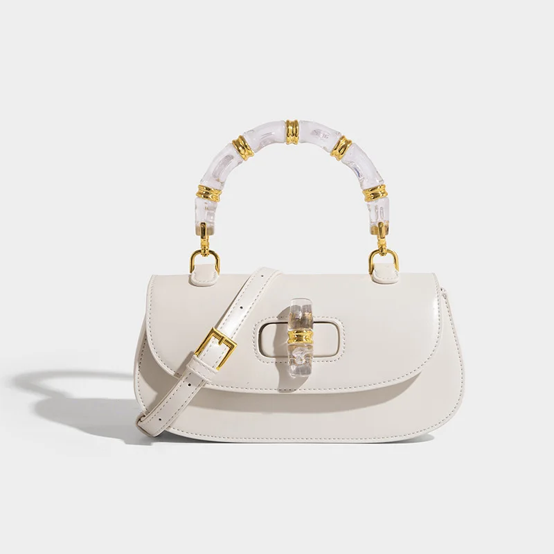 super beau sac à main en bambou rétro marque sac de selle nouveau sac pour femmes haut de gamme exquis luxe rose serrure en cuir sac à bandoulière