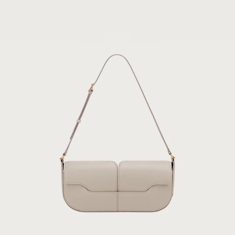 niche automne et hiver sac sous les bras à une épaule, sac à main en peau de vache, sac baguette à main décontracté et simple