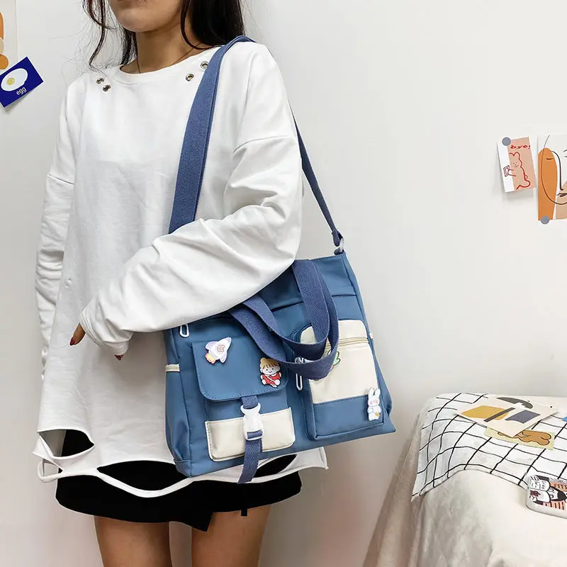 nouveau sac à main d'école de créateur sac de messager pour les jeunes adolescentes sac à bandoulière fourre tout grande capacité en nylon femmes sac à bandoulière cartables