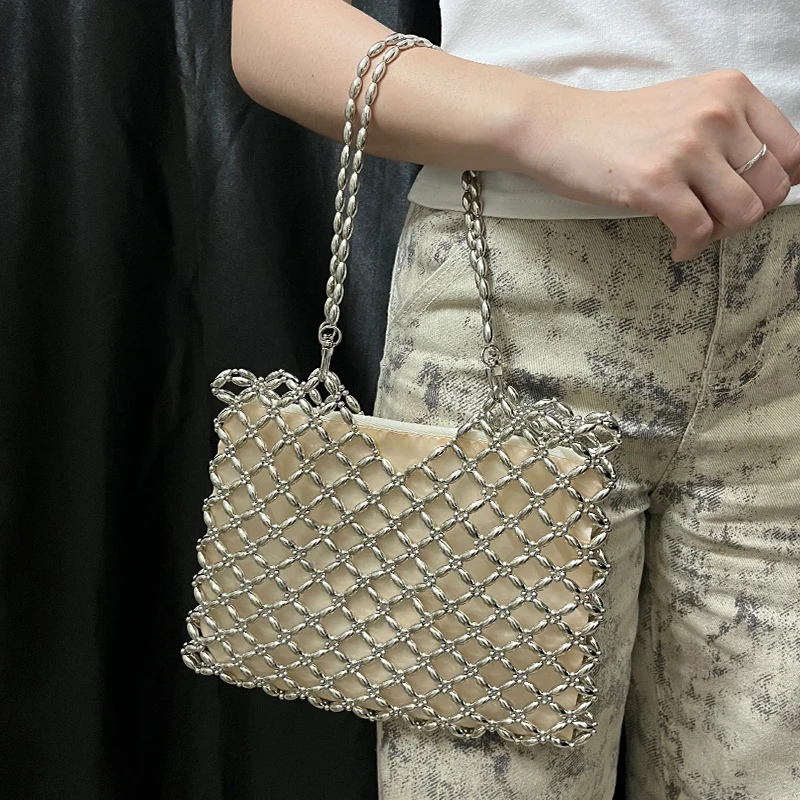 sac femmes 2025 nouveau décontracté à la main argent perlé creux sac tissé sac à main simple épaule sous les bras mère sac