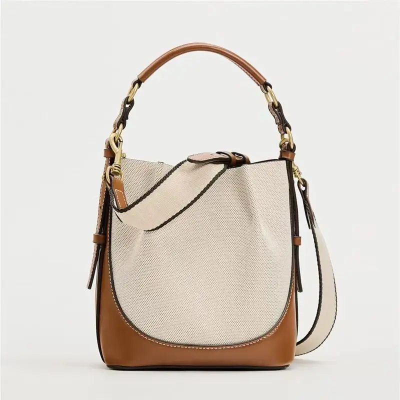 Mode nouveau sac pour femmes marron Style coréen cordon Portable bandoulière large cordon seau sac