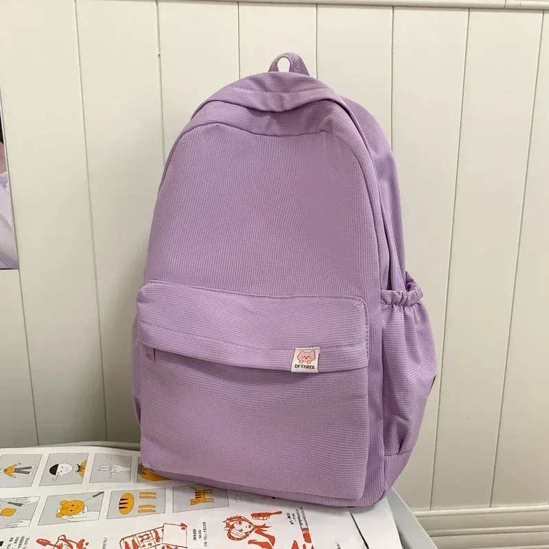 nouveau sac à dos imperméable en nylon pour femmes sac de voyage pour femmes sacs à dos cartable pour adolescentes couleur unie bookbag mochila bookbag