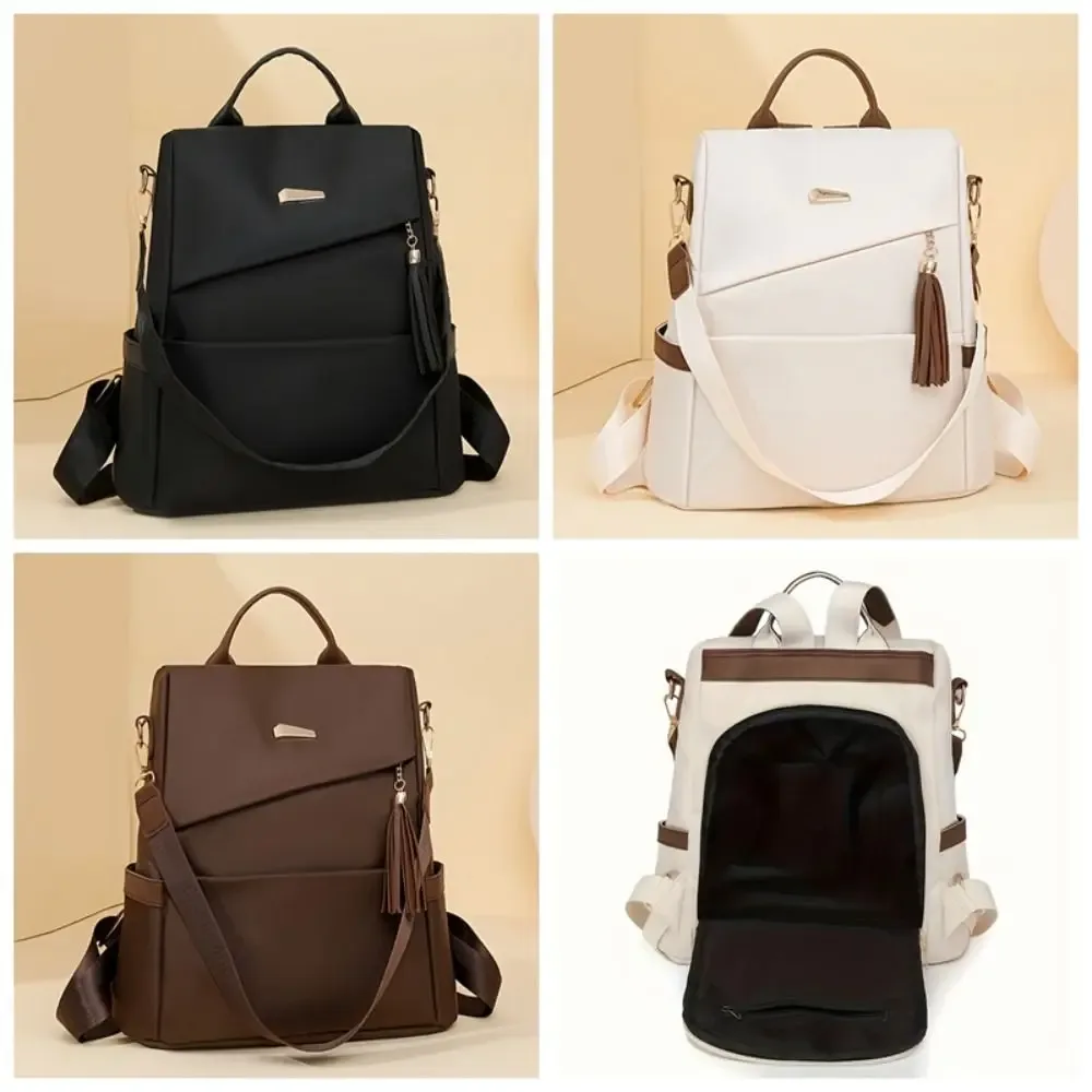 sac à dos en nylon de grande capacité pour femmes, sac à dos imperméable de couleur unie, doux au toucher, multi-poches, avec pompon décoratif, sac à dos antivol