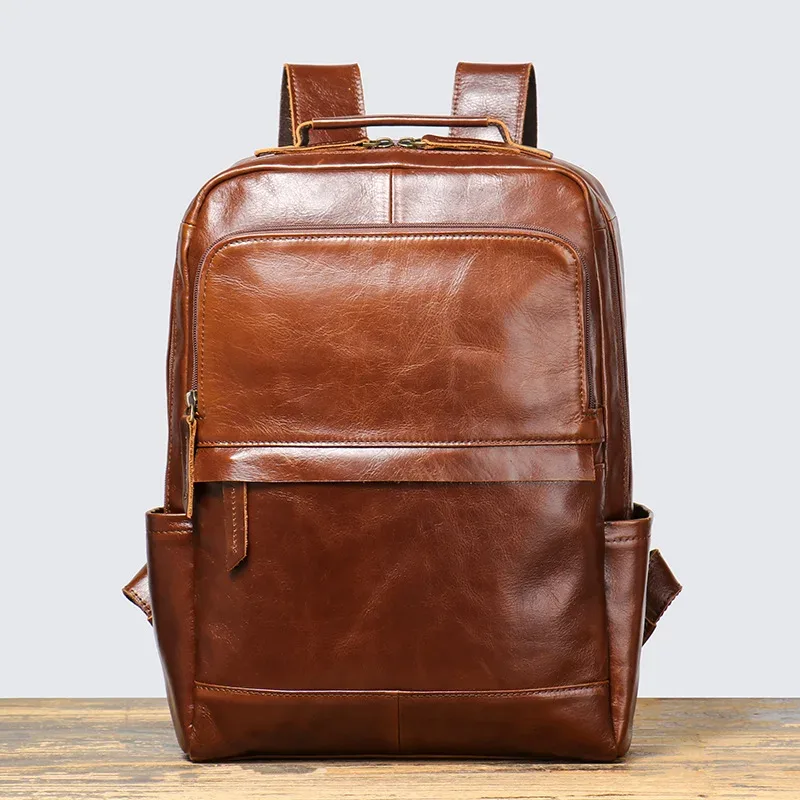 yetties rétro nouveau style couche supérieure peau de vache hommes voyage sac à dos femmes en cuir véritable ordinateur sac à dos grande capacité sac à main