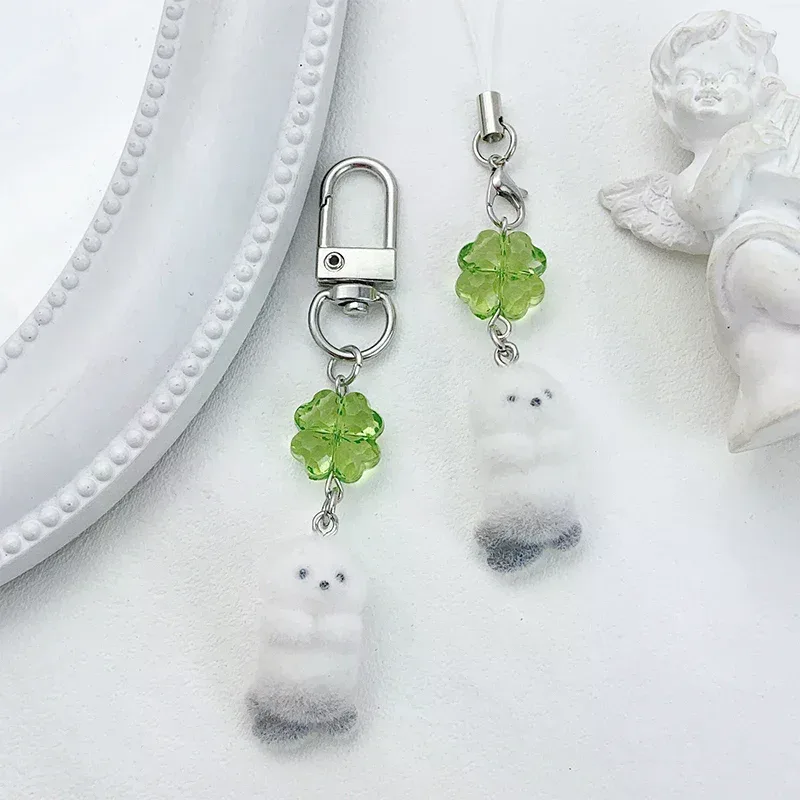 breloque de téléphone anime mignonne en forme de loutre, pendentif caméra trèfle à quatre feuilles kawaii, porte-clés tendance et élégant, décoration pour sac à dos, cadeau
