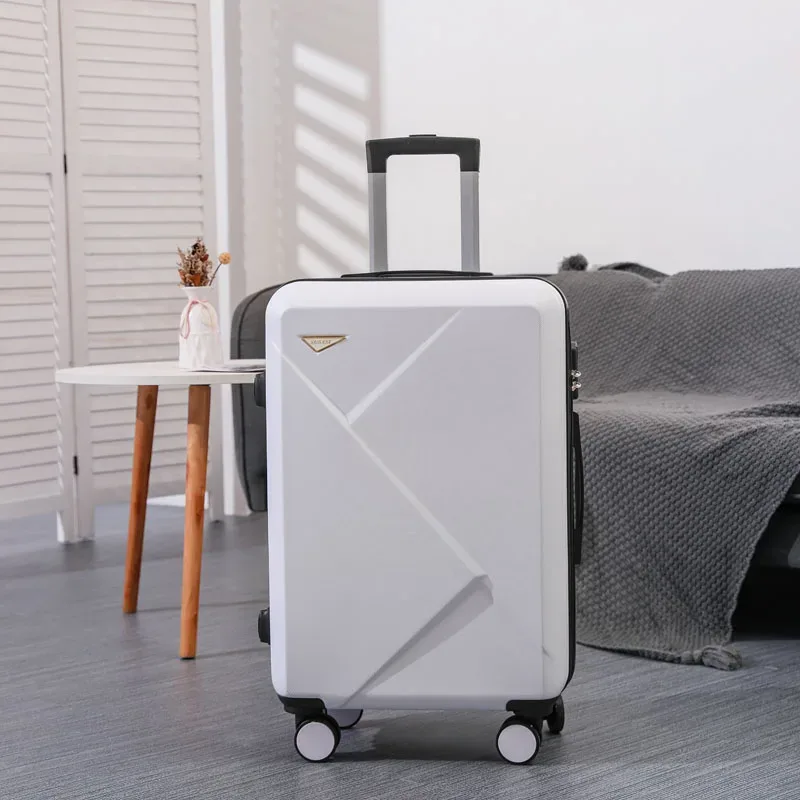 valise abs plastique dur motif géométrique lignes diagonales relief gris rose blanc jaune vert bleu rouge bagage affaires voyage