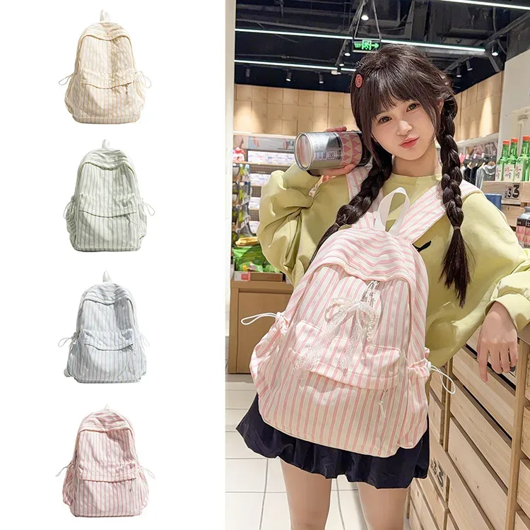 nouveau style japonais, sac à dos décontracté à rayures, grande capacité, pour collégiennes, idéal pour les voyages, sac à dos à double bandoulière pour filles 2026