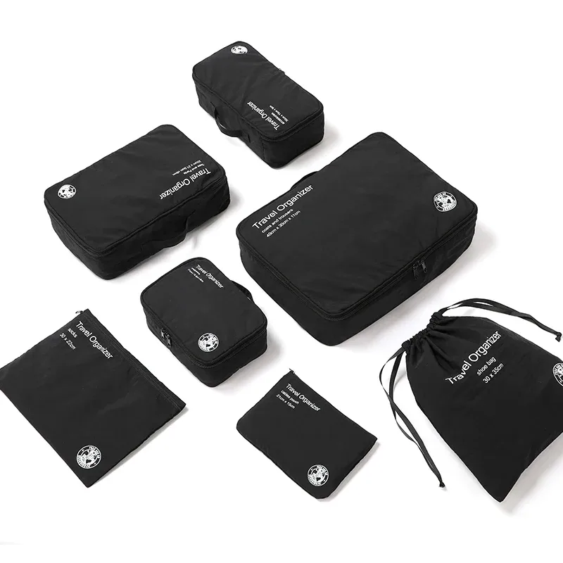 organisateur voyage sac rangement nylon noir géométrique seven pièces usage transport vêtements accessoires compression