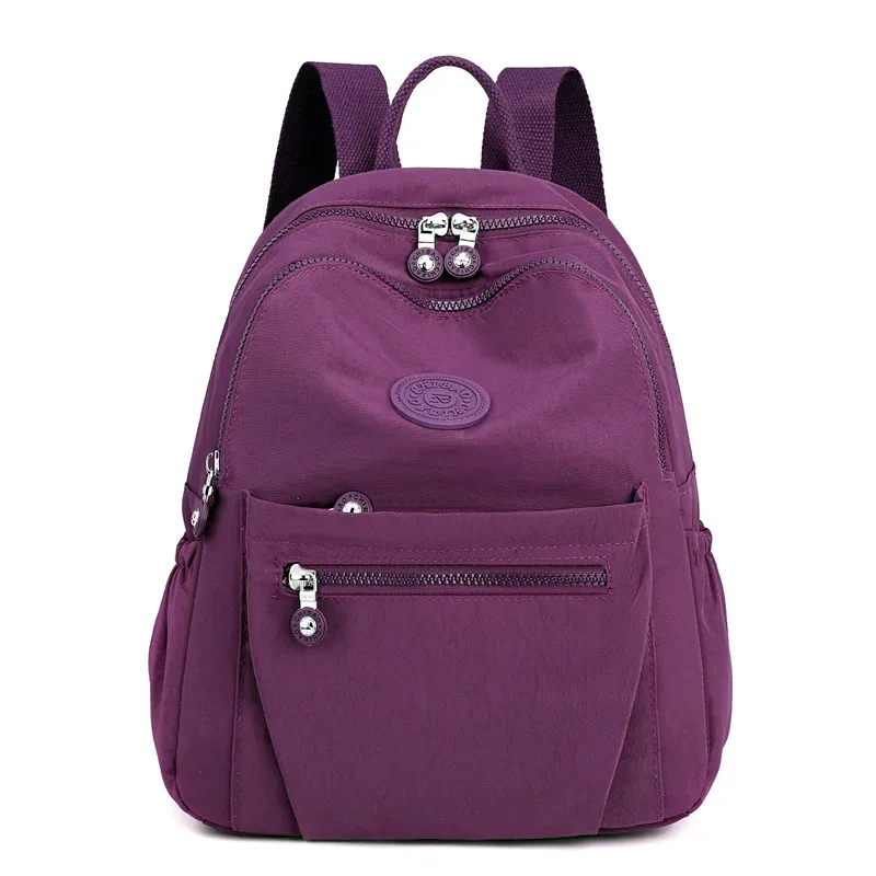 sac à dos léger en nylon pour femme, sac fourre-tout en nylon multi-poches, sac à dos décontracté imperméable pour les voyages, les trajets domicile-travail et l'usage quotidien