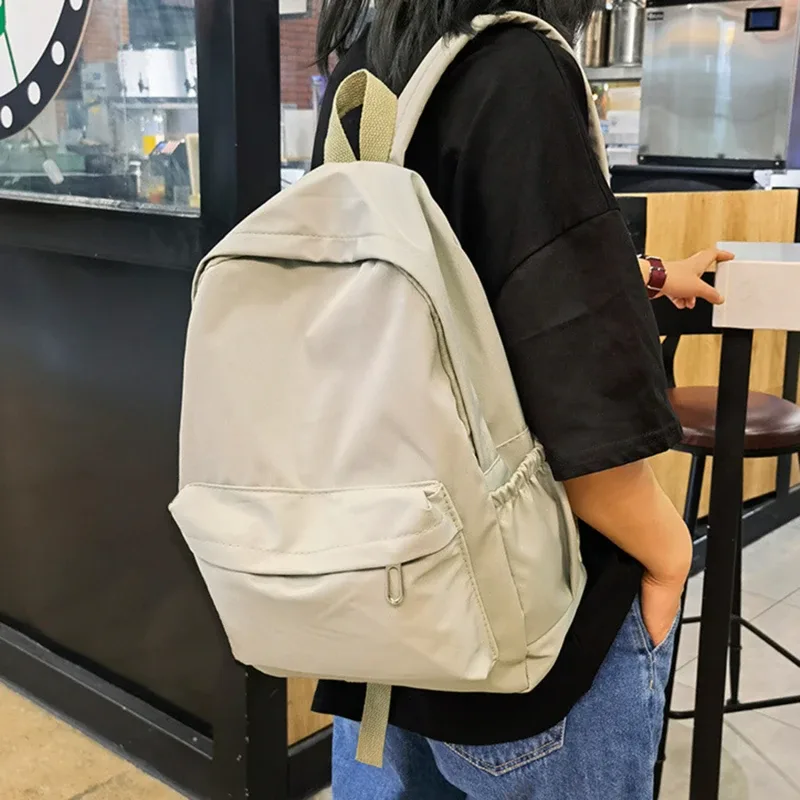 sac à dos d'école imperméable de grande capacité pour femmes, fermeture éclair lisse, couleur unie, sac à dos décontracté pour adolescentes, sac à dos pour étudiantes