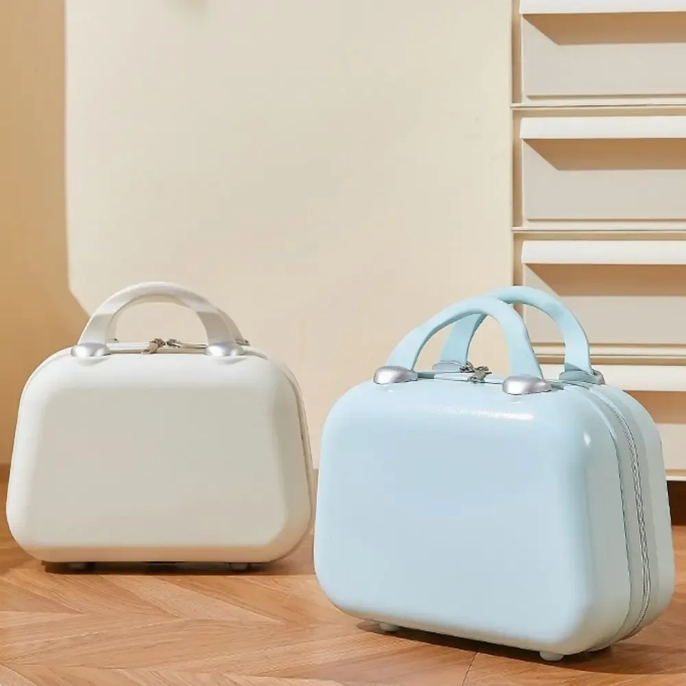 organisateur voyage plastique bleu pastel rectangulaire poignées latérales roues coins grande capacité durable compression sac chaussures pochette housse vêtements