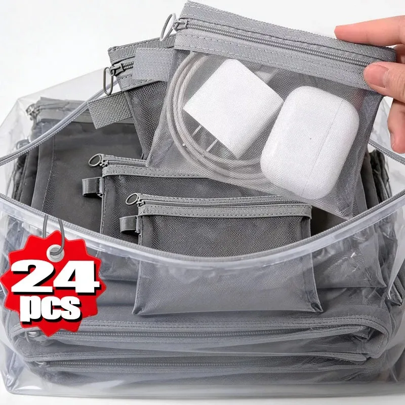 trousse toilette nylon transparente gris poignées noires poches zippées accessoires maquillage voyage usage universel
