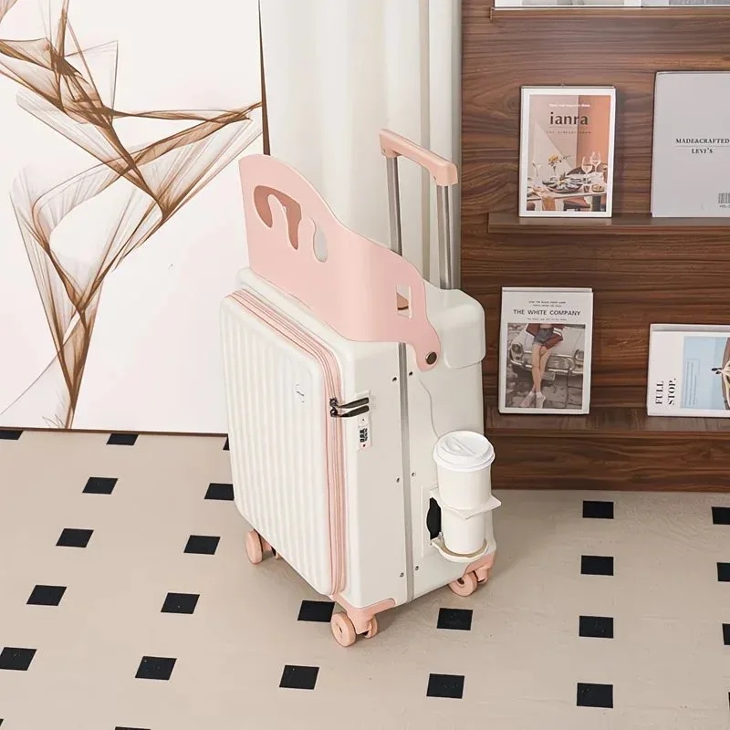 valise plastique dur pc blanche accents roses siège intégré roulettes toupie usage voyage enfant