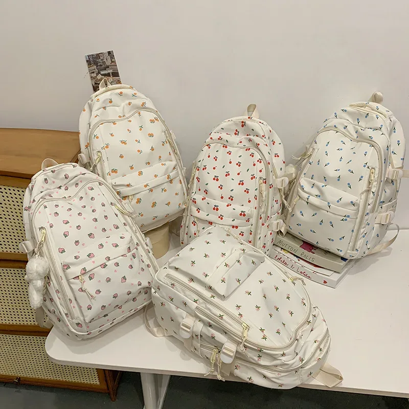 sac à dos décontracté à imprimé floral grande capacité pour filles, sac d'école en nylon imperméable, capacité pour ordinateur portable 14 pouces, style frais et doux