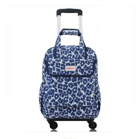 sac dos oxford université motif floral roses rouges fond bleu nuit toupie roulettes transport voyage femmes