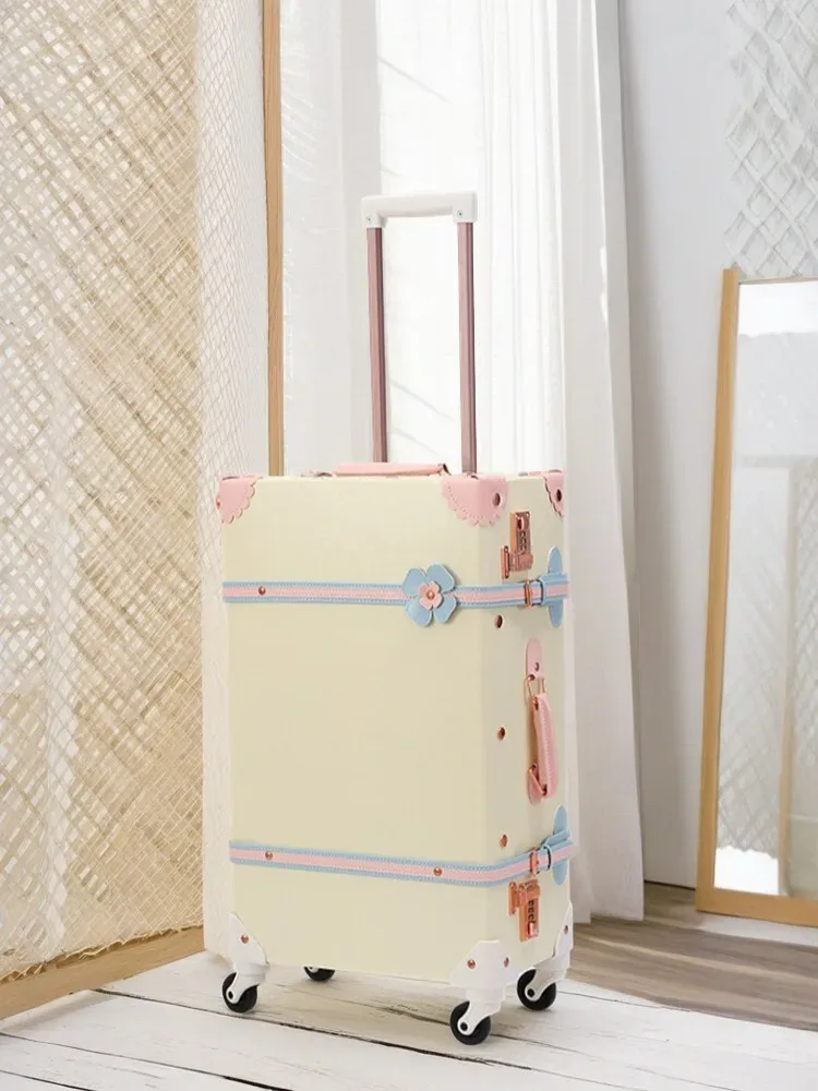 valise design rétro beige accents roses bleus motifs floraux poignée supérieure roulettes plastique dur voyage