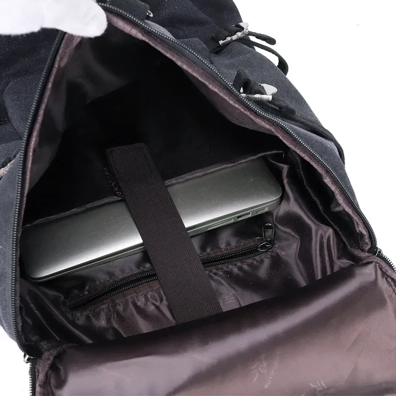 sac dos toile cuir bandes marron toile beige fermetures glissières poignée souple capacité voyage