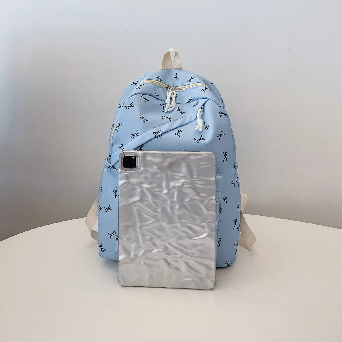sac à dos tendance et mignon avec imprimé de nœuds, sac à dos pour ordinateur portable avec protection pour ordinateur portable, bretelles réglables, sac à dos pour ordinateur portable pour la rentrée scolaire.