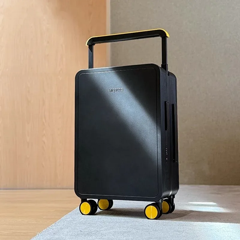 valise pc jaune noir gris système tsa serrure poignée large roues toupie compacts voyage organisés segurança modernes linhas verticale façade contraste efficace intérieur compartiments