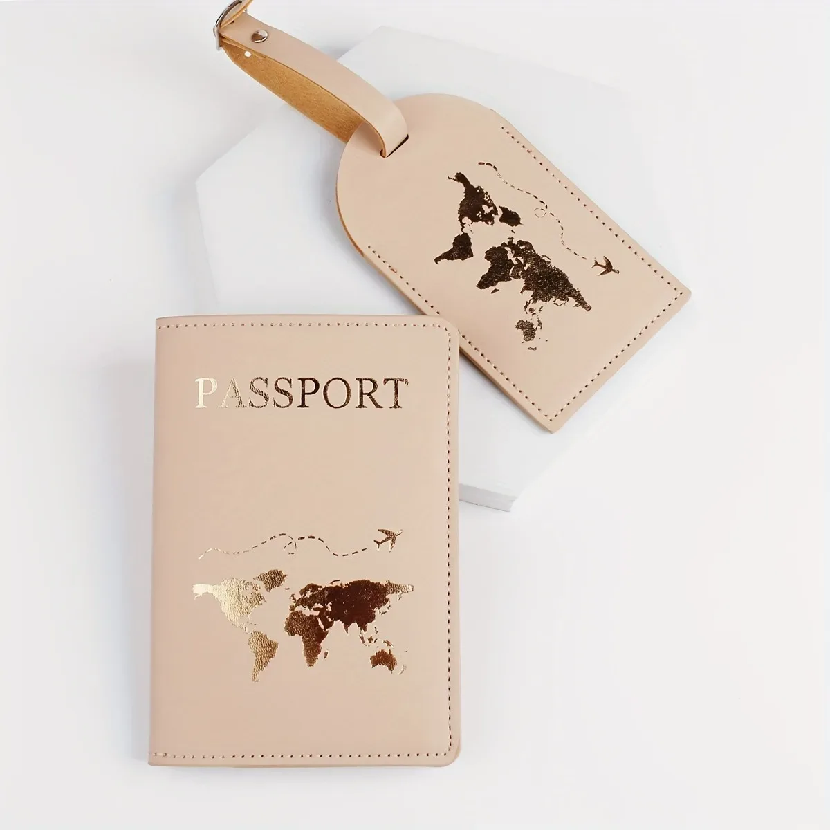 étiquette bagage cuir verni rose carte monde dorée voyage identification passeport porte nom adresse