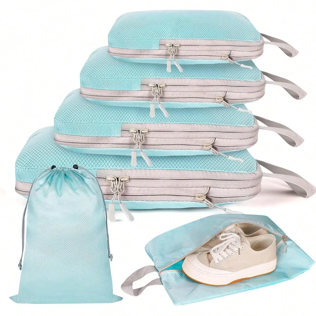 organisateur voyage polyester gris clair poignée noire fermeture glissière compressible sac chaussures rangement cube traçabilité usage polyvalent