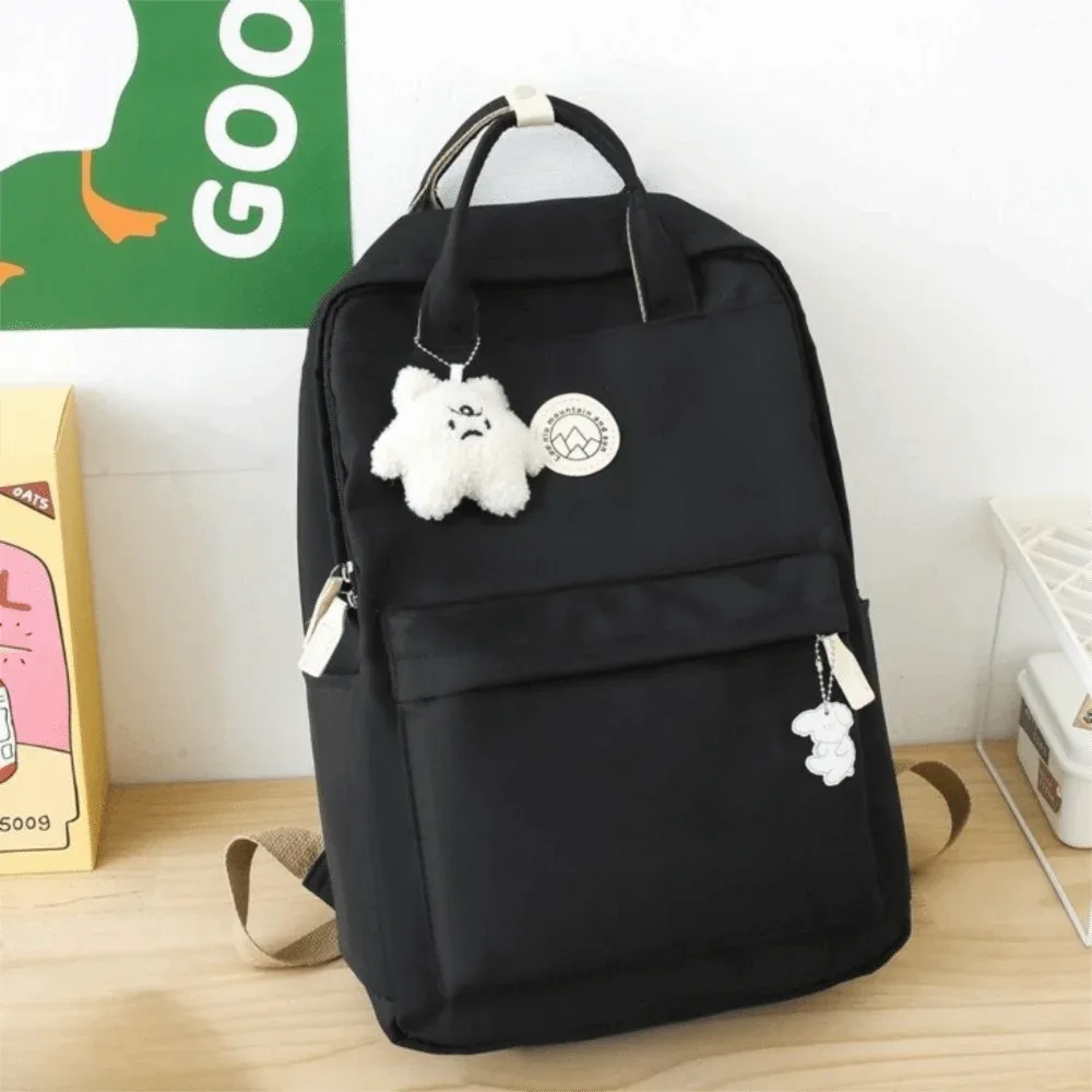 sac à dos léger et imperméable pour femmes, grande capacité, couleur unie, sac d'école en nylon, sac à dos ergonomique de voyage et de loisirs